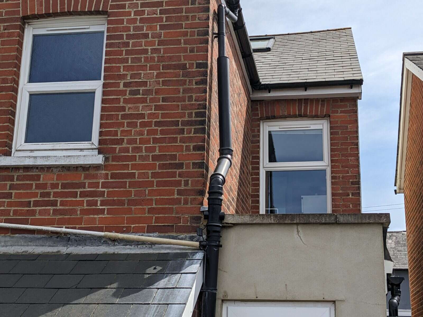 Pebbledash semi with a bay window fitted with retrofit Glass Vents